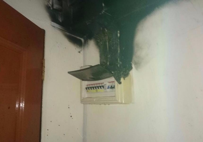 Emergency electrician fixing faulty light switch and electrical wiring issues